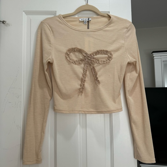 Long sleeve bow top - Picture 1 of 3